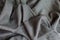 Folded grey viscose fabric with geometric print
