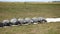 Folded parachutes lying on the ground