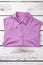 Folded purple women shirt.