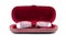 Folded reading glasses inside red case cover