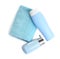 Folded soft towel and toiletries, top view