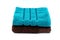 Folded Turquoise and Brown Towel