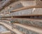 Folded wooden planks in a sawmill. Piled boards as texture