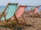 Folding deck chairs striped red and green with white stripes