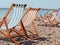 Folding deck chairs striped red and green with white stripes