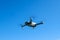 Folding drone flying in a sky