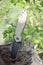 Folding travel knife made of stainless steel with black blade an