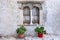 Folegandros island, Windows of an old church at Chora town square. Greece, Cyclades