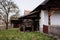 Folk architecture and life, farmhouse with cart, Traditional historic country-style architecture in Skanzen, Polabi open-air