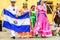 Folk dancers with El Salvador national flag, Guatemala