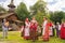 Folk festival dedicated to the Holy Trinity at the Museum of wooden architecture of Vitoslavlitsa. Girls in traditional sundresses