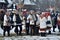 Folklore collective performs Christmas and Malanka songs during the ethnic festival of Christmas Carols in open-air museum,Ukraine