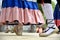 Folkloric dance. Men and women dancing in traditional costumes