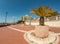 FOLLONICA, ITALY - SEPTEMBER 28, 2016: promenade by the sea with palms in planter pots