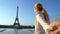 Follow Me Paris Happy Woman Leading her Boyfriend to Eiffel Tower