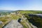 Follow the meandering rutted path along Baslow Edge to a distant Curbar Edge