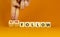 Follow or unfollow symbol. Businessman turns wooden cubes and changes words follow to unfollow. Beautiful orange background, copy