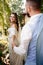 follow your loved one. newlywed to hold hands. Bride and groom walk in park