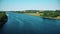 Following a boat along the river Shannon Ireland