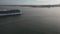 Following a giant cruise ship on the Tagus River, Lisbon, Portugal followed by a reveal of th
