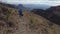 Following Man Hiking Down the Emory Peak Trail