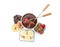 Fondue forks with strawberries in bowl of melted chocolate and other fruits on white background