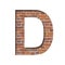 Font on brick texture. Letter D, cut out of paper on a background of real brick wall. Volumetric white fonts set