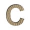 Font on a embossed metal sheet. The letter C is cut out of white paper on the background of a weathered sheet of metal with a