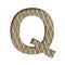 Font on a embossed metal sheet. The letter Q is cut out of white paper on the background of a weathered sheet of metal with a