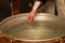 Font with water for baptism in Orthodoxy. Christian ritual of the consecration of Christ