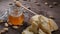 Food art. Different sorts of cheese and honey in glass bowl beautifully arranged on wooden background. Top view. Red