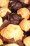 Food background - closeup of assorted muffins.