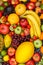 Food background fruits collection apples berries portrait format banana oranges fruit