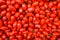 Food background. plum cherry tomatoes top view pattern