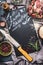 Food background for Recipes of Lamb shoulder cooking. Raw meat , butcher knife , rice and ingredients around chalkboard with handw