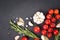 Food background - variety of seasonings, herbs and vegetables over dark concrete background with copy space