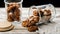 Food banner. Homemade healthy gluten-free oatmeal cookies in glass jars. Healthy food or fitness snack. Oats, isolated milk