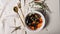 Food banner. A portion of mussels with vegetables in a white bowl on a light background. Delicious and healthy seafood. Shellfish