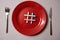 Food blogging, blog and blogger or social media concept: symbol hashtag on the red plate. Flat lay