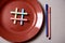 Food blogging, blog and blogger or social media concept: symbol hashtag on the red plate. Flat lay