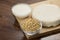 Food : Bowls of Soy Milk,Soybeans and Tofu Isolated on Wooden Background