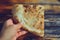 Food of the Caucasian Georgian kitchen,, a girl holds pieces in hands. Piece of pita bread in hand