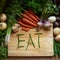 Food, chopping board and message for eating, nutrition and cooking for wellbeing or love. Home, wellness and vegetables