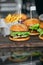 Food. Closeup Burgers And Hamburgers In Fast Food Restaurant