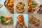 Food collage with a variety chicken snack dishes