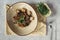 food composition with sprouts in bowl soba with tofu and vegetables decorated with germinated seeds of sunflower