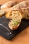 Food Concept french beefs Rillettes  spread on homemade crusty artisan ciabatta bread with flax microgreen for breakfast or
