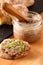 Food Concept french beefs Rillettes  spread on homemade crusty artisan ciabatta bread with flax microgreen for breakfast or