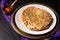 Food concept spot focus homemade Paratha, Parotta or Porotta layered flatbread  on black background with copy space