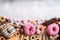 Food containing sugar. mix of sweet donuts, cakes and candy with sugar spread and written text in unhealthy nutrition, chocolate